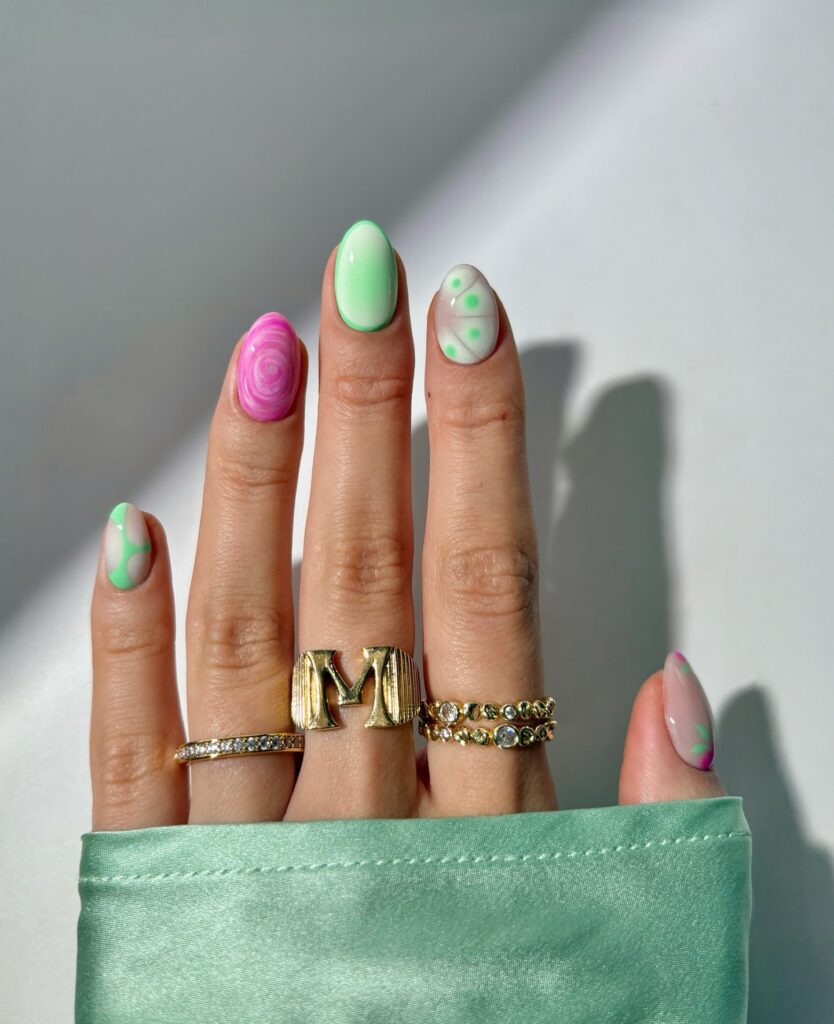 Almond Nail Ideas with Mint Green and Pink Abstract Florals for a Retro Summer Manicure