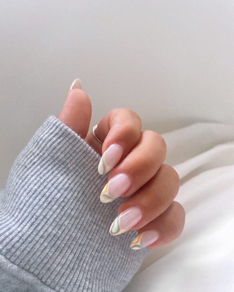 Almond Nails with Swirled Green and Mustard Tips for Minimalist Spring Nail Ideas
