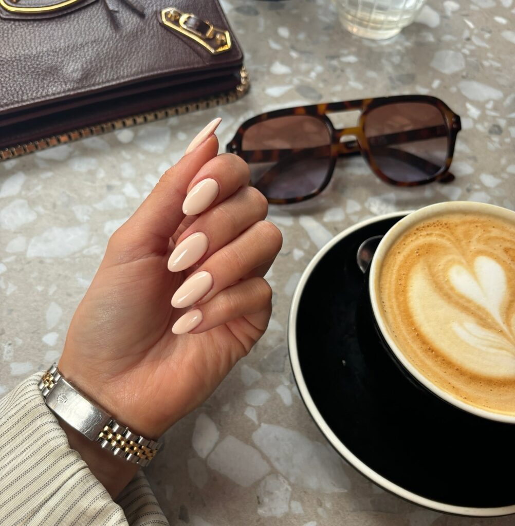 Almond nude nails with glossy minimalist finish for a timeless and elegant everyday nail idea