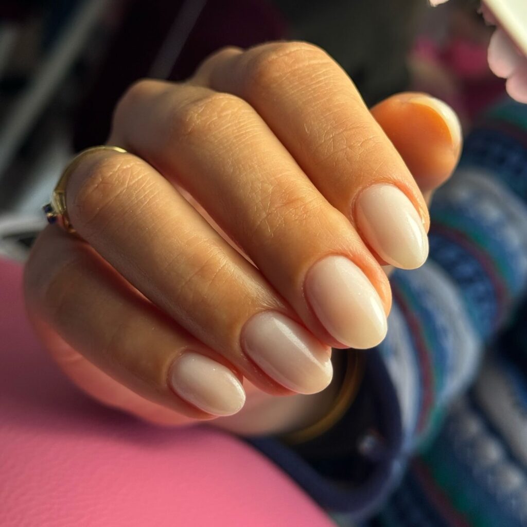 Almond shaped milky nude nails for soft and natural white nail ideas