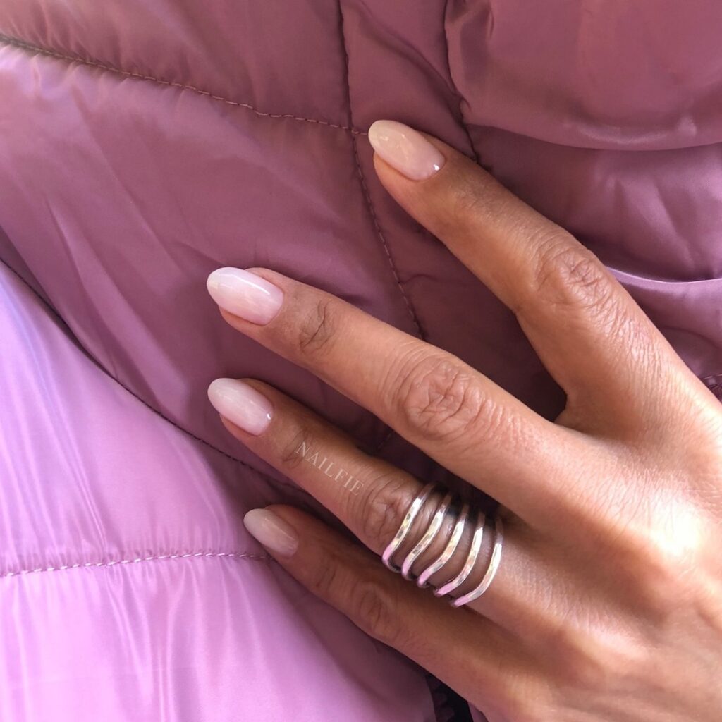 Almond Shaped Milky Pink Nails with Sheer Buildable Gloss for Understated Luxury
