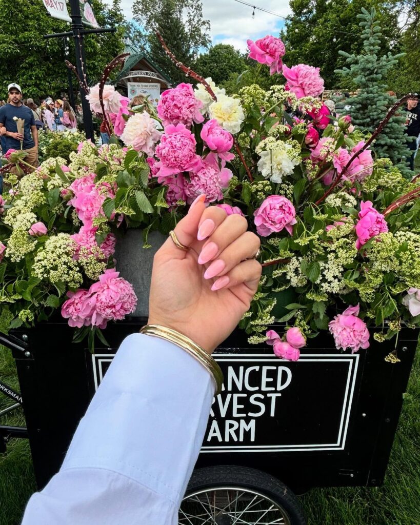 Baby pink almond nails with glossy shine for classic spring nail ideas