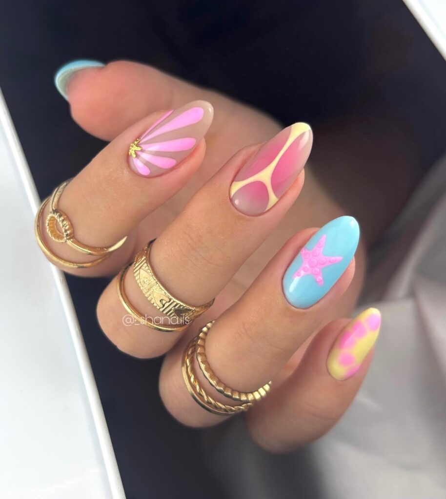 Beach-Inspired Almond Nails with Starfish and Petals for Summer Birthday Vibes