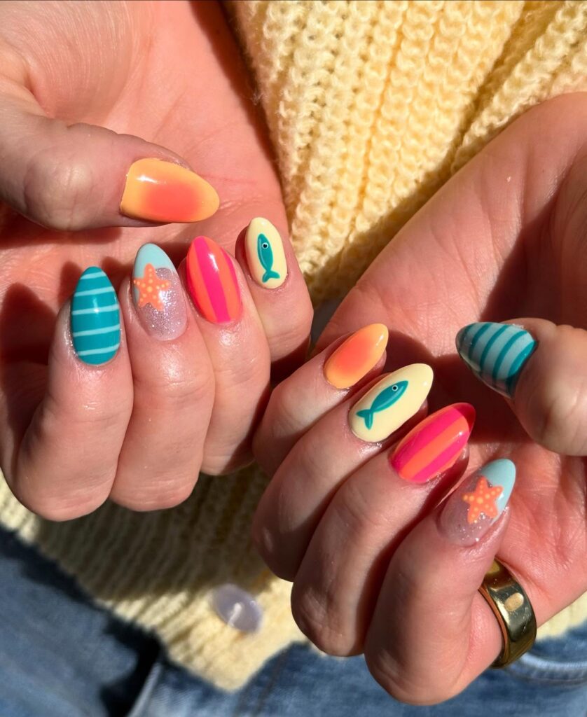 Beach-Inspired Almond Nails with Sunset Ombré and Ocean Accents