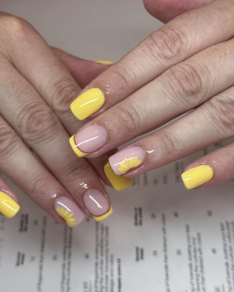 Bold square yellow nails with french tips and sunflowers – vibrant summer yellow nail ideas