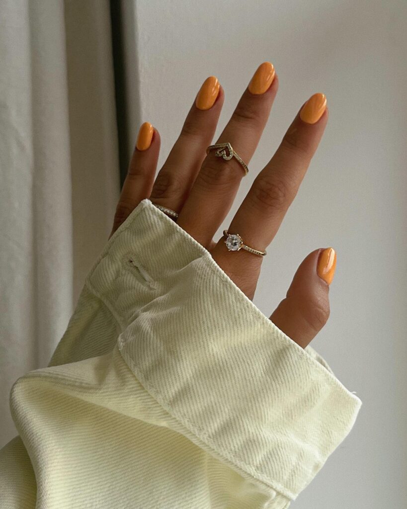 Bright Orange Almond Nails for a Bold and Simple Summer Look