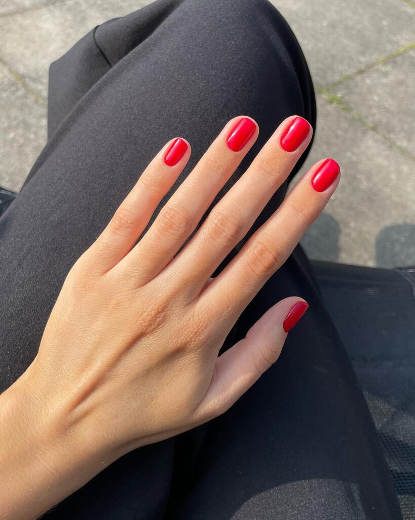 Classic Short Rounded Red Nails for a Timeless Summer Statement