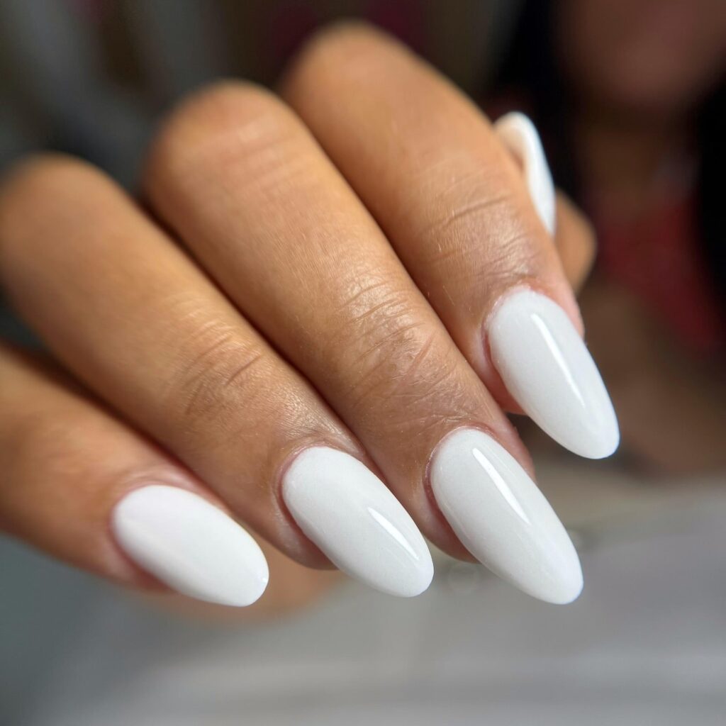 Classic Glossy Almond Nails in Opaque White for Understated Elegance