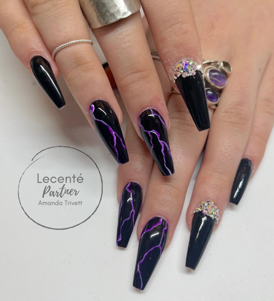 Coffin Nails with Lightning Bolt Art and Crystal Embellishments for an Edgy Birthday