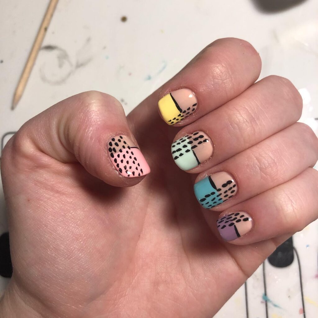 Colorful Patchwork Short Nails with Pastel Blocks and Graphic Accents