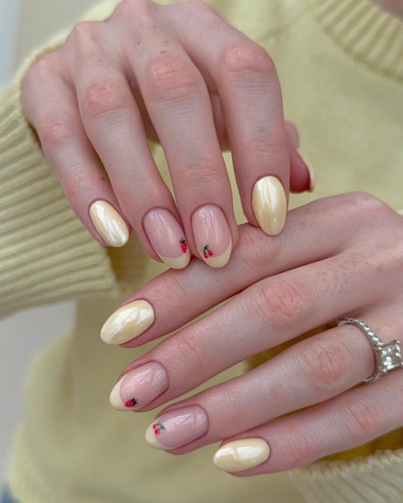 Creamy Pastel Yellow Almond Nails with French Tips and Cute Fruit Nail Art Ideas for Spring