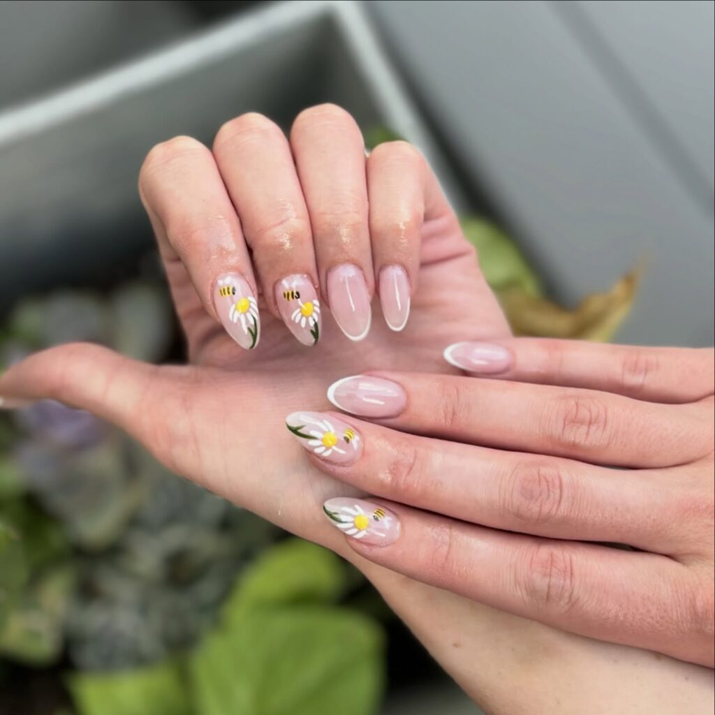 Daisy and Bee Nail Ideas with Nude Base and White French Tips for Garden Days