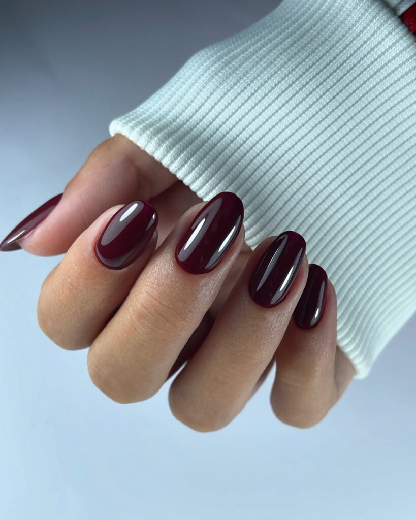 Deep Burgundy Oval Nails – Bold Yet Professional Nail Idea for Fall and Winter