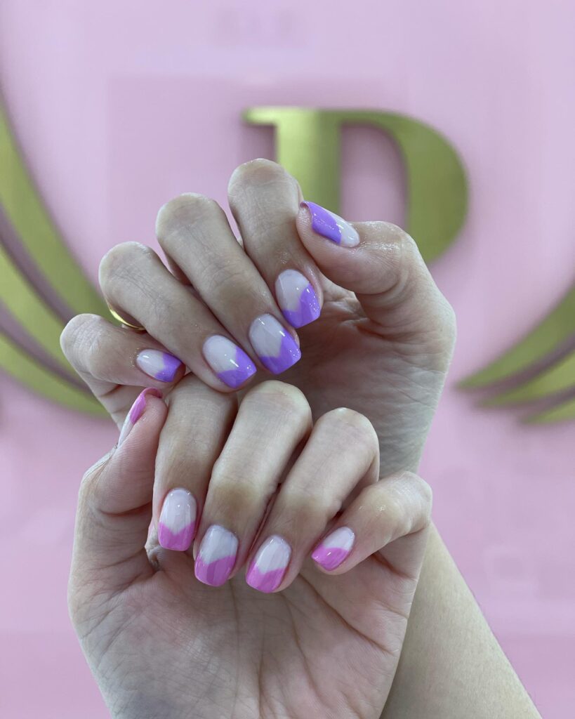 Diagonal French Nail Ideas in Lavender and Pink on Short Nails for a Modern Pastel Touch