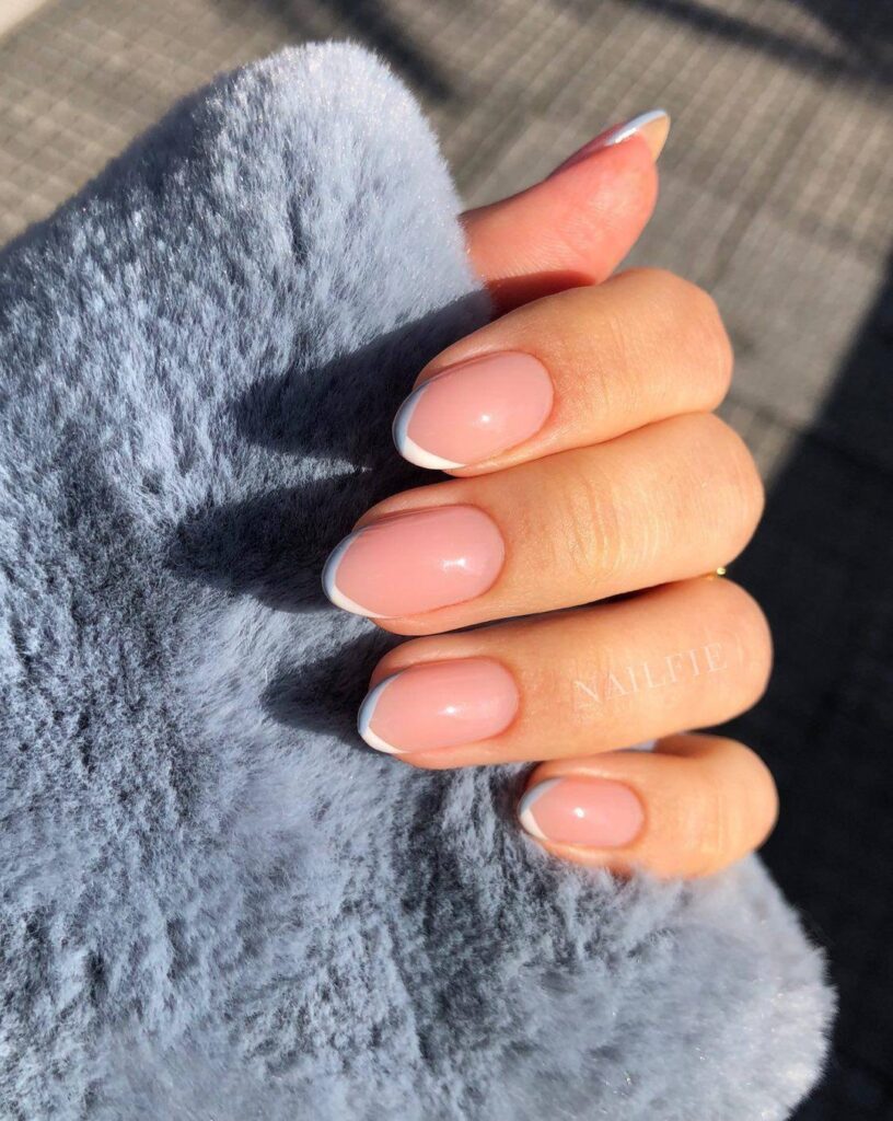 Diagonal French Tips on Nude Oval Nails – Modern Twist on a Classic Office Manicure