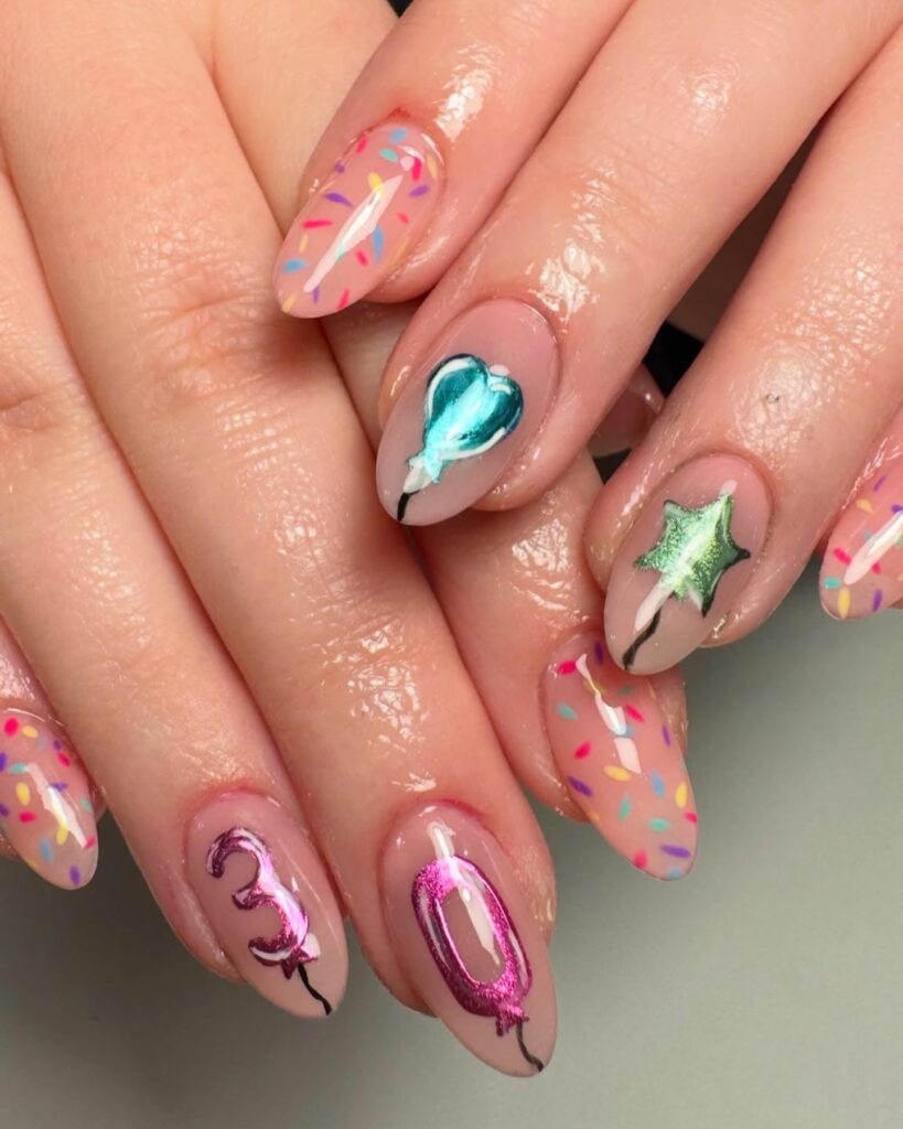 Festive Almond Birthday Nails with Confetti Sprinkles and Balloon Art
