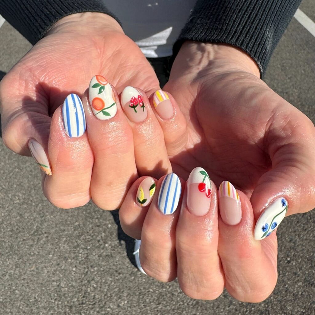 Fruit and Floral Striped Nails with Sheer Base for Whimsical Garden Nail Ideas