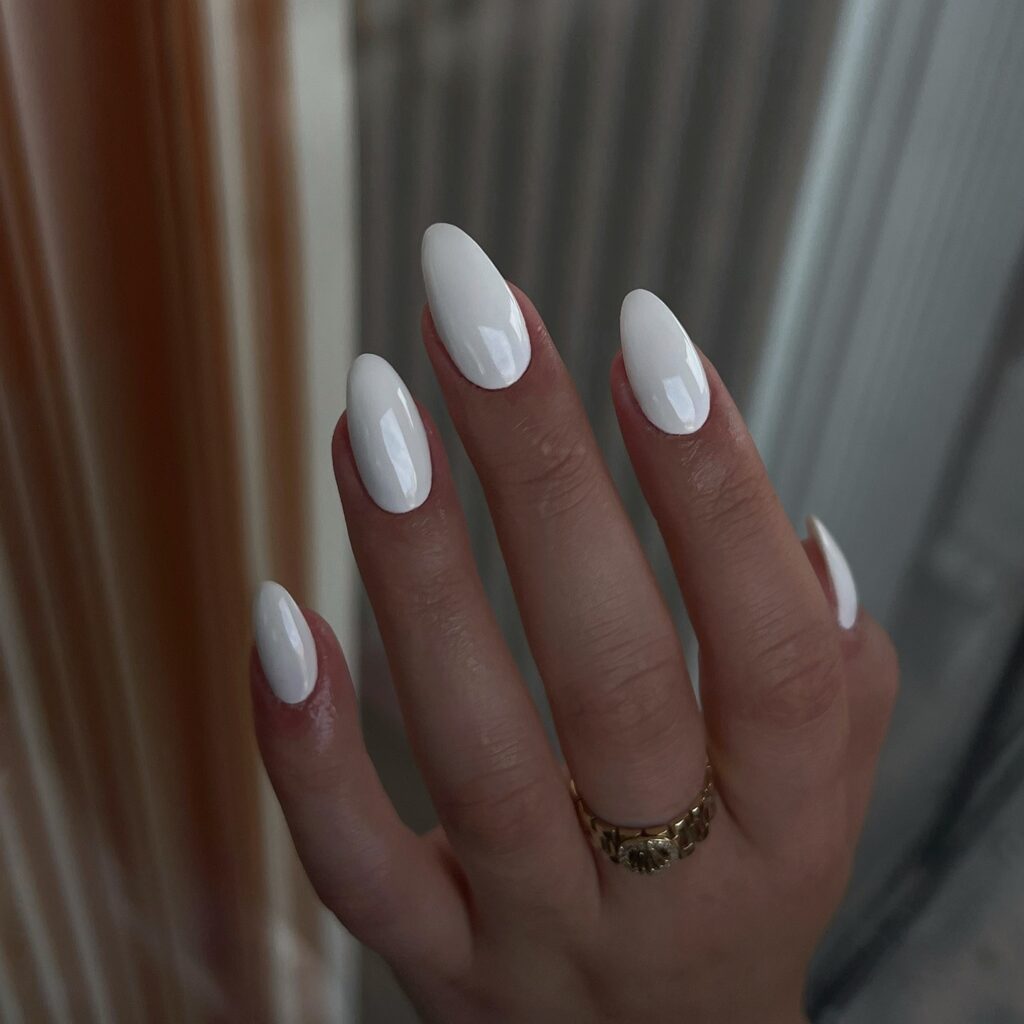 Glossy Almond White Nails – Feminine and Polished White Nail Ideas for Any Occasion