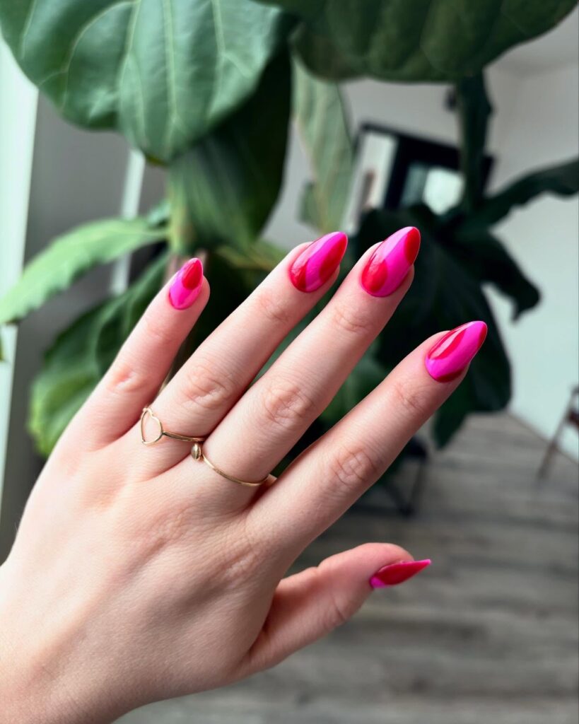Glossy Hot Pink Flame Almond Nails – Bold and Trendy Graduation Nail Ideas for Summer