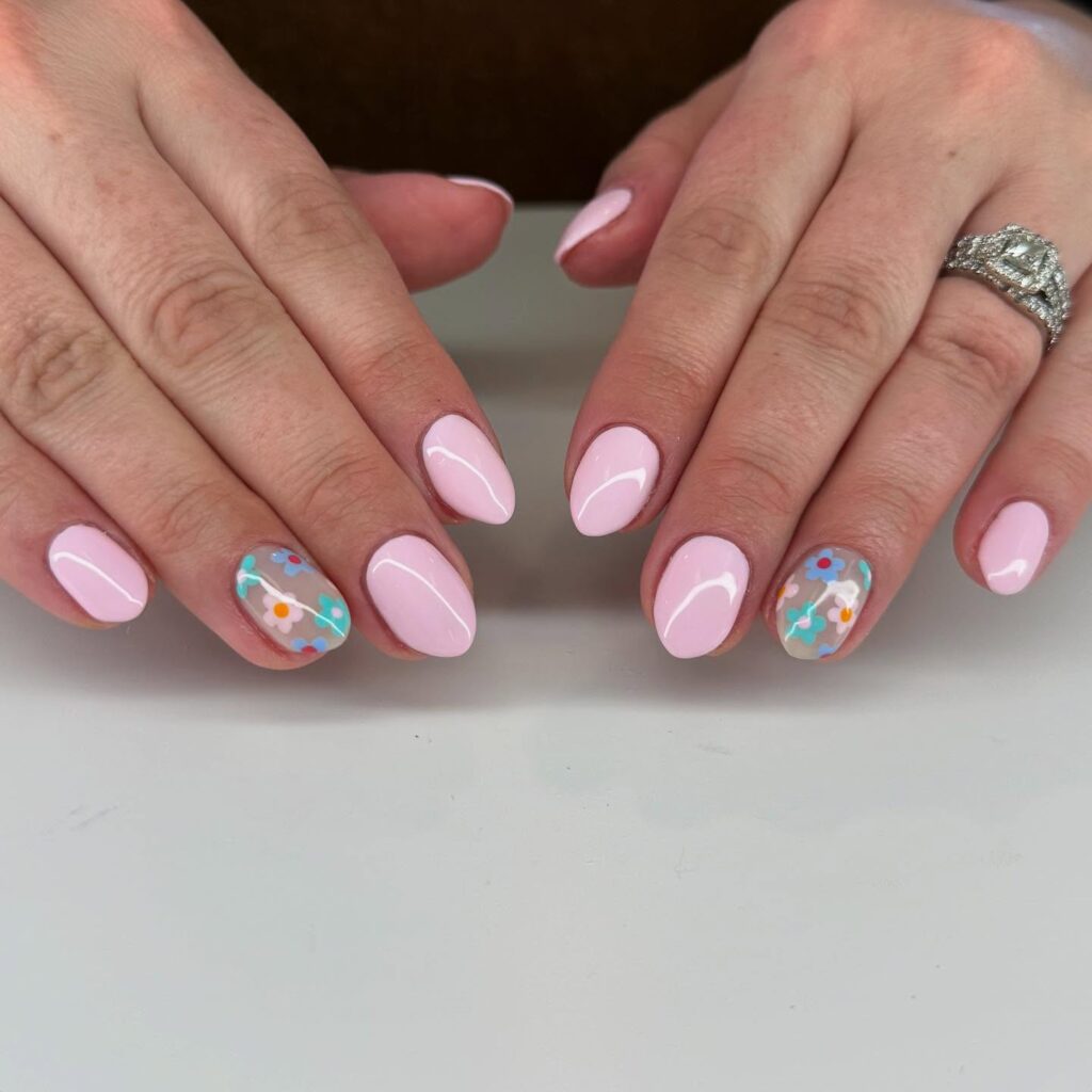 Glossy Light Pink Nails with Colorful Daisy Accents – Whimsical Floral Nail Ideas