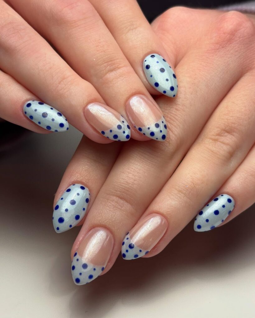 Icy Blue Polka Dot Almond Nails with Sheer French Tips – Playful Graduation Nail Ideas