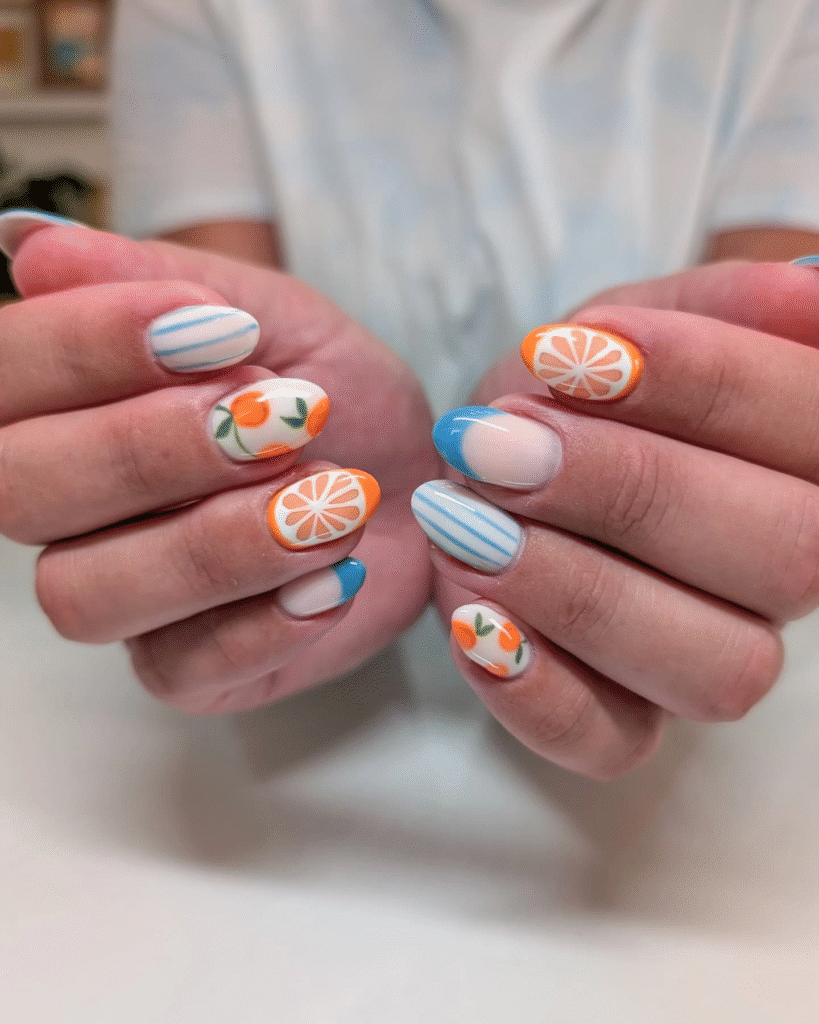 Juicy Orange Slice and Blue Stripe Oval Nails for a Summer Refresh