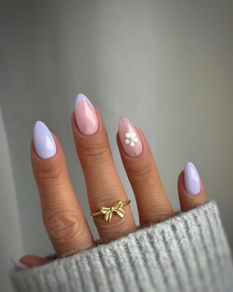 Lavender and Sheer Pink Almond Nails with Daisy Accents for an Elegant Spring Vibe