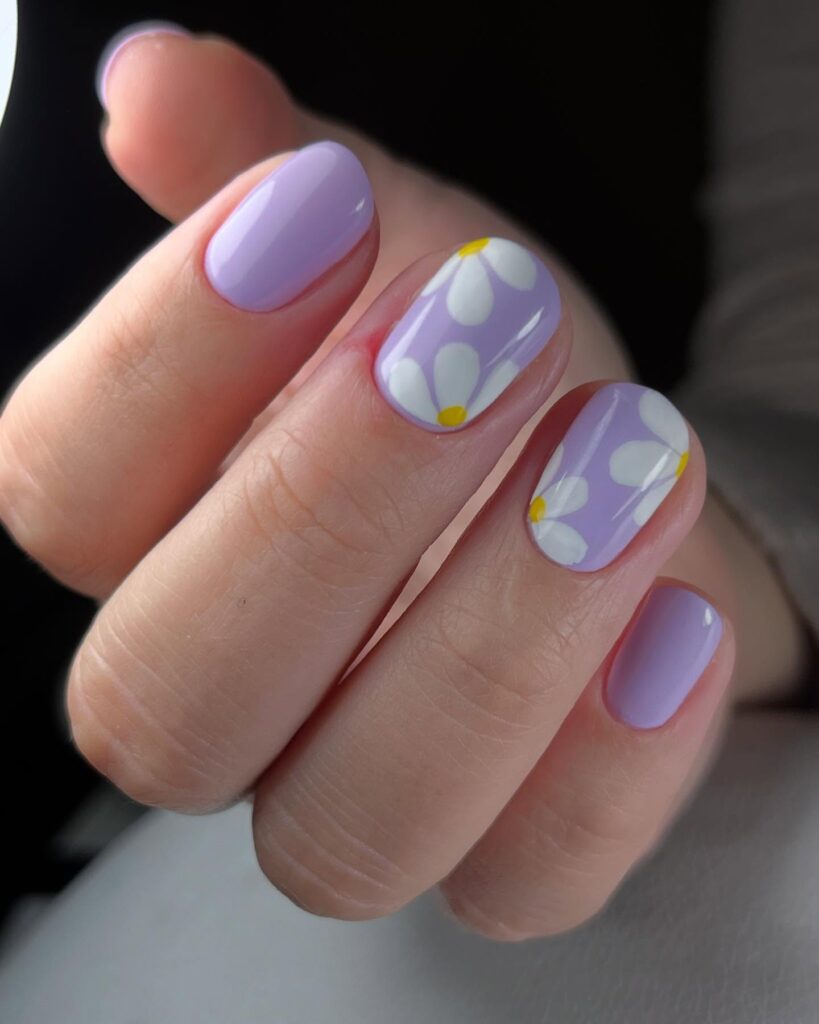 Lavender nails with white daisies spring floral nail ideas with a soft feminine touch