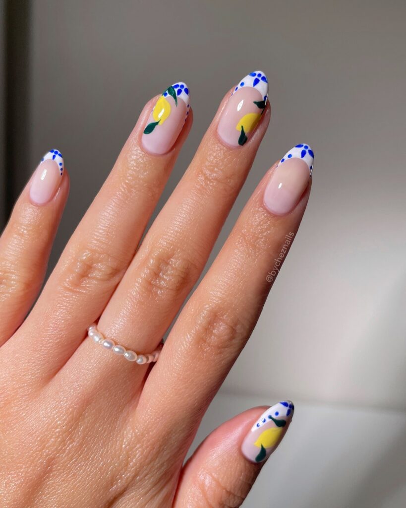 Lemon and Floral Almond Nails with Pink Base for a Mediterranean Summer Nail Art Look