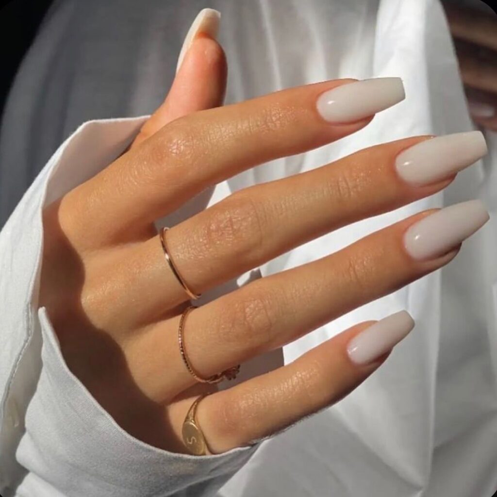 Long Nude Coffin Nails with Glossy Finish for Chic Neutral Style