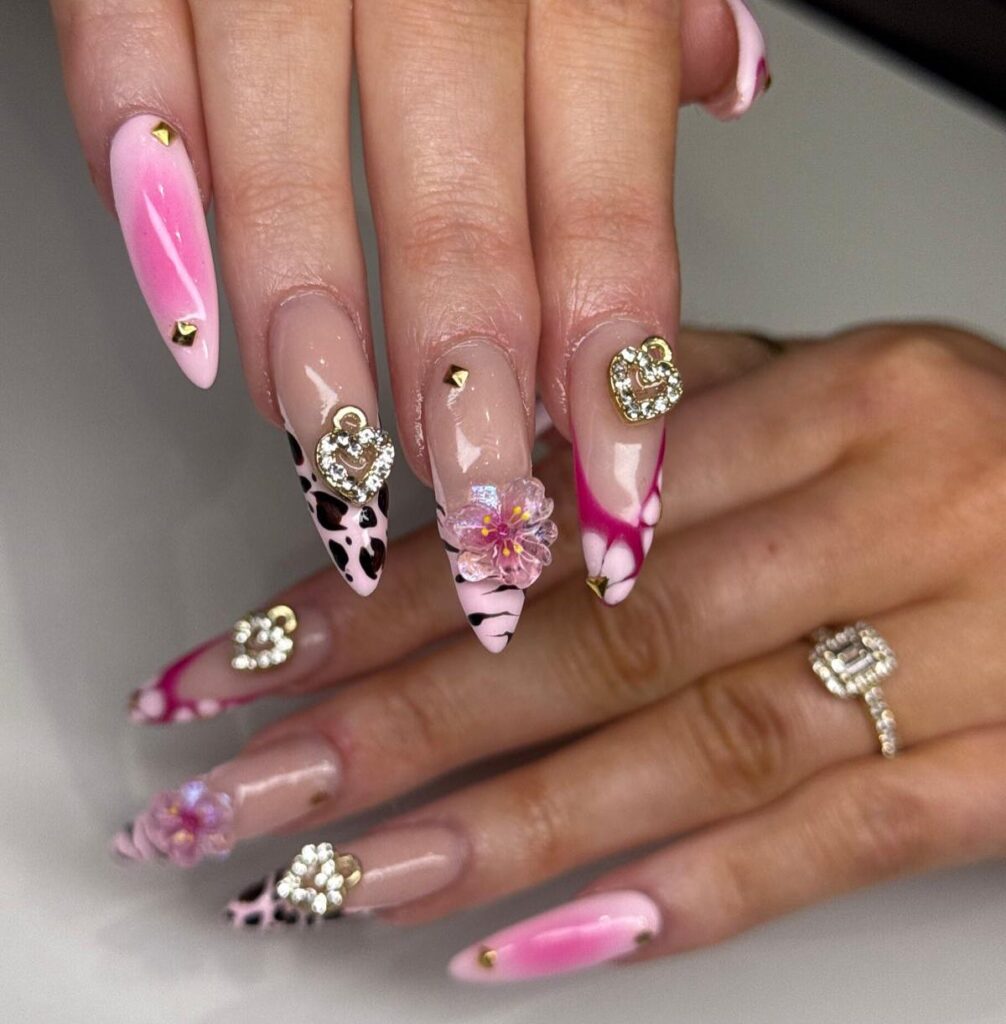 Long Stiletto Pink Birthday Nails with Leopard Print, Marble Swirls, Rhinestones, and 3D Floral Embellishments for Glam Look