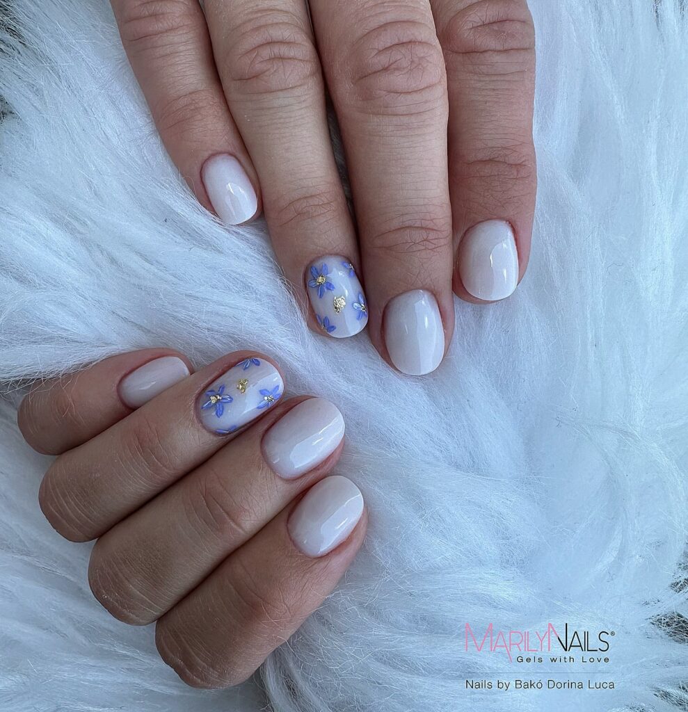 Milky White Nails with Blue Floral Art – Feminine and Graceful Simple Nail Ideas for Spring