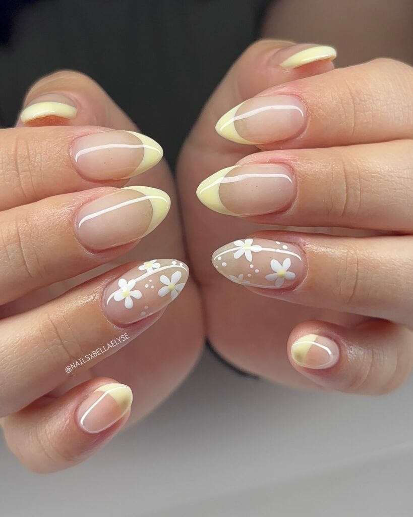 Minimalist Nude Nails with Pastel Yellow French Tips and Playful Daisy Nail Ideas for Spring