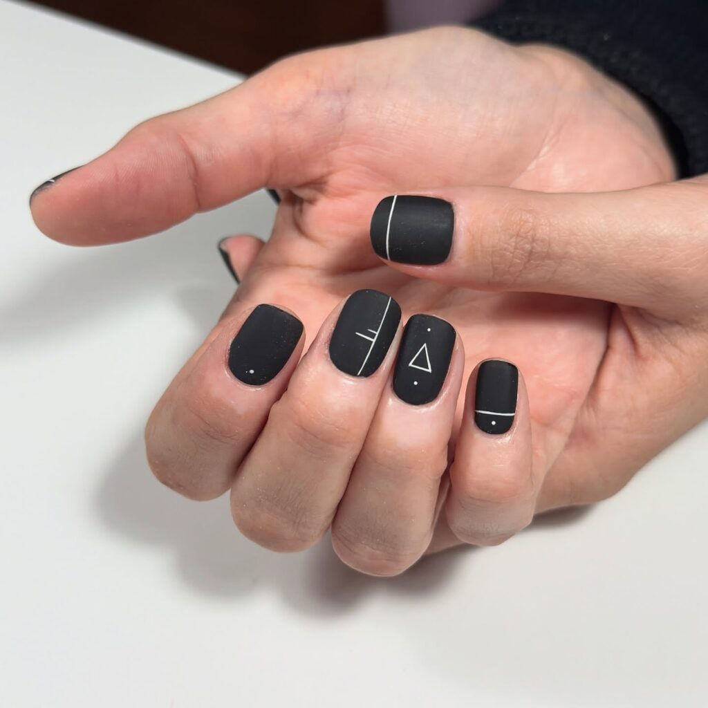 Minimalist Matte Black Square Nails with White Geometric Line Art – Modern Nail Idea for Everyday Style