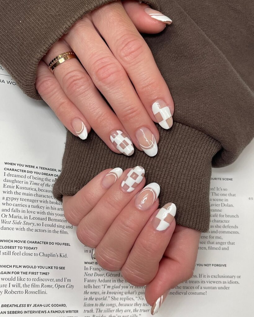 Modern French Almond Nails with White Checkered Tips for a Chic Spring Look