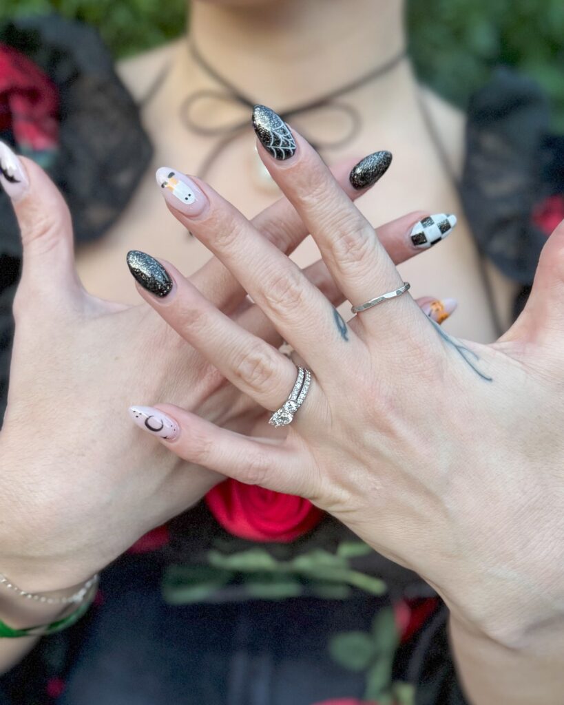 Monochrome Halloween Art on Almond Nails – Gothic Short Nail Ideas with Playful Black and White Details