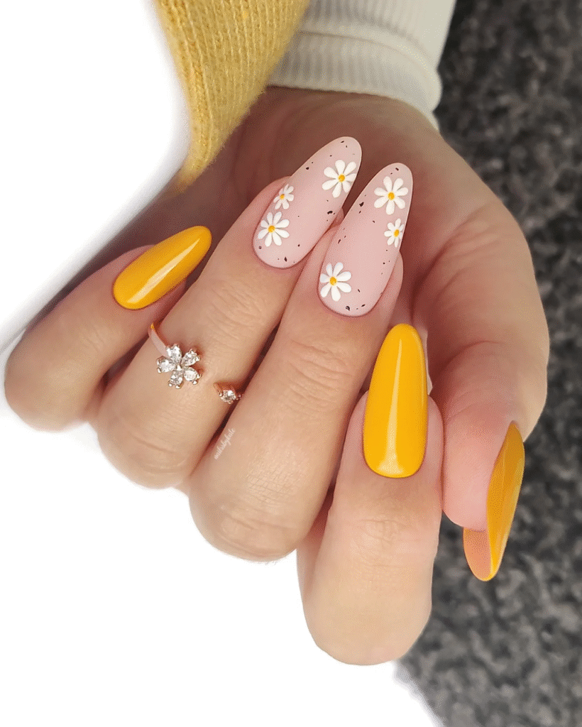 Mustard Yellow Almond Nails with Daisy Art for a Whimsical Spring Look
