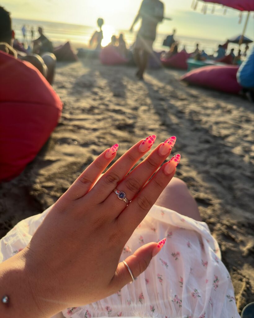 Neon Pink Snake Print Almond Nails with Rhinestones for a Bold Beach Vibe