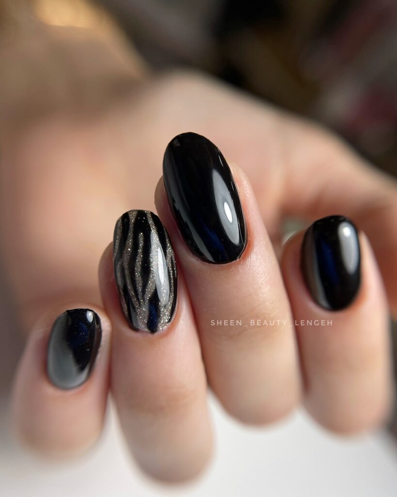 Oval Short Black Nails with Silver Wave Detail – Chic and Subtle Sparkle Nail Ideas
