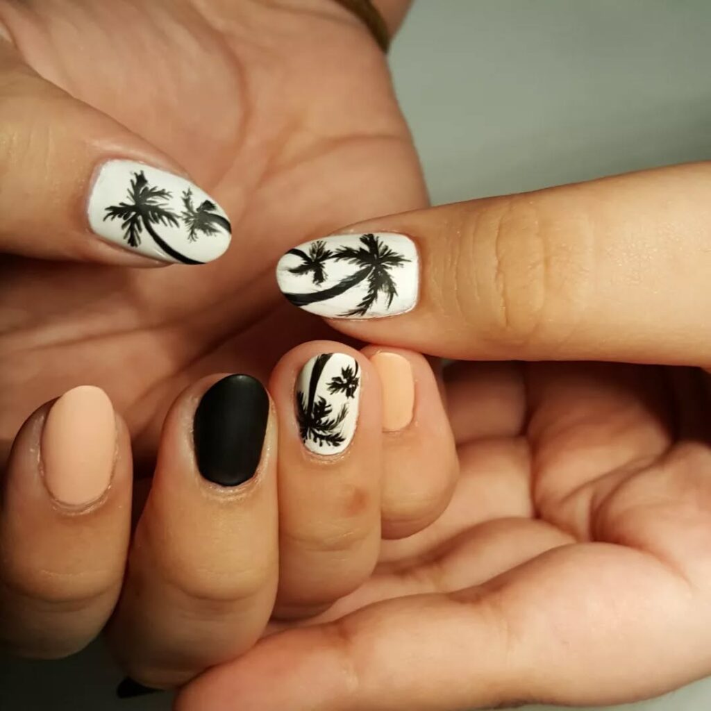 Palm Tree Oval Nails in Nude, Black, and White for a Minimal Tropical Look