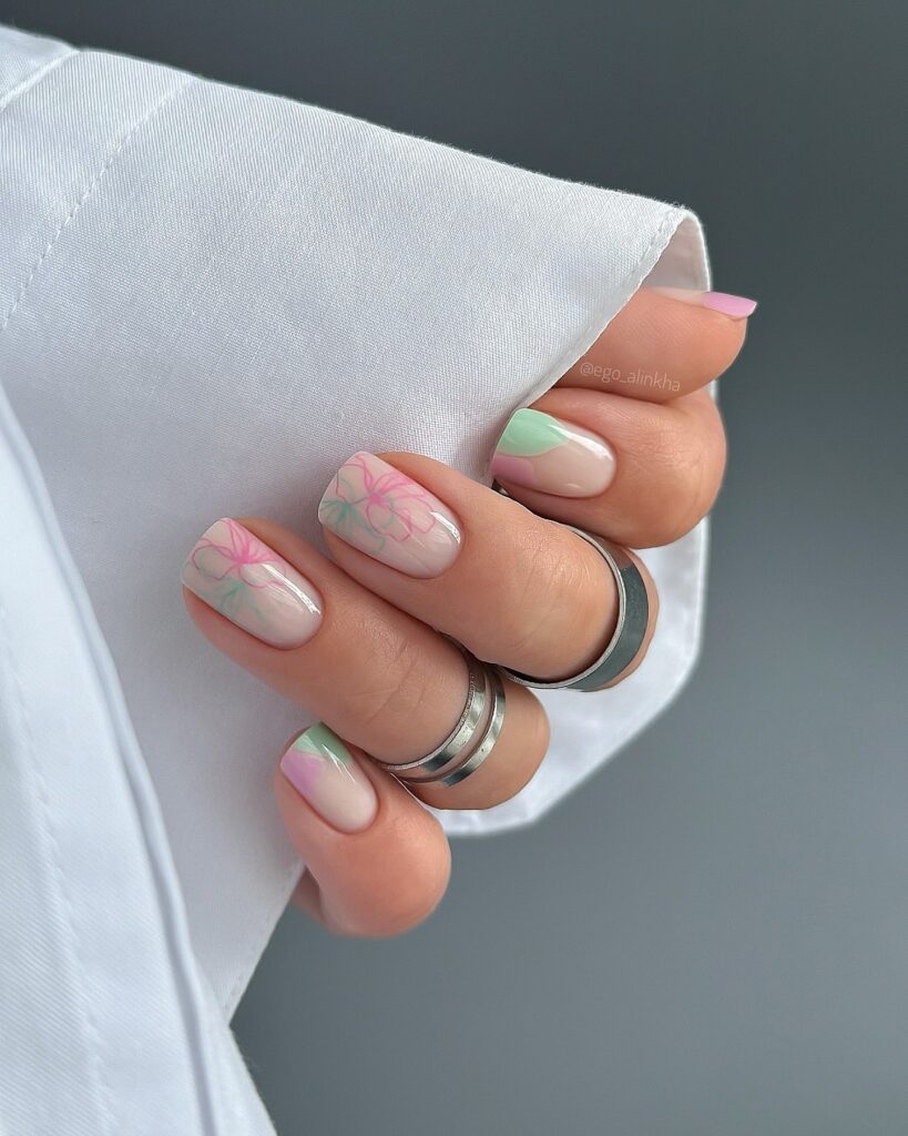 Pastel Floral Line Art on Nude Pink Nails – Artistic Botanical Nail Ideas for Spring
