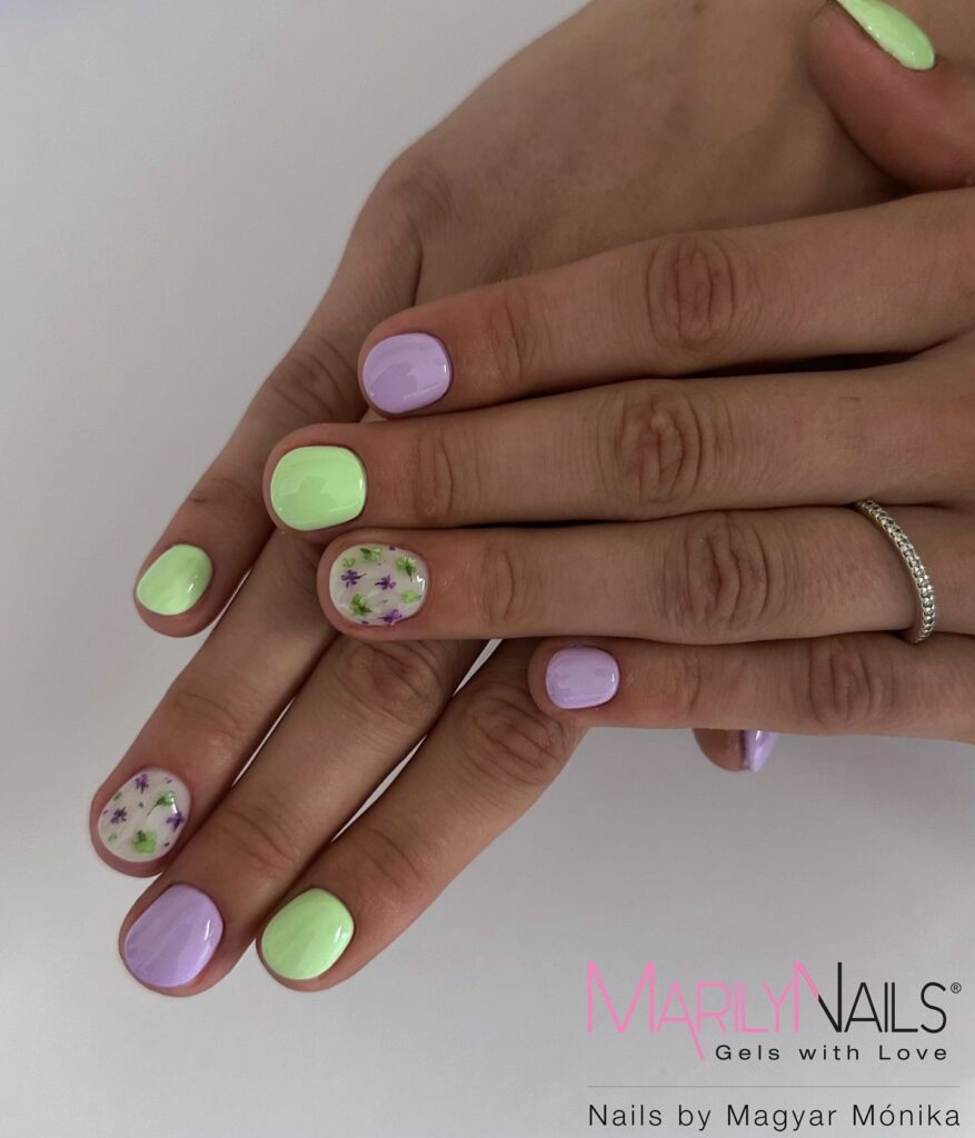 Pastel Green and Lavender Short Nails with Floral Accents – Whimsical Spring Nail Ideas