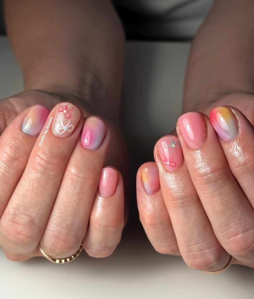 Pastel Ombré Short Nails with Floral Line Art and Glitter Accents