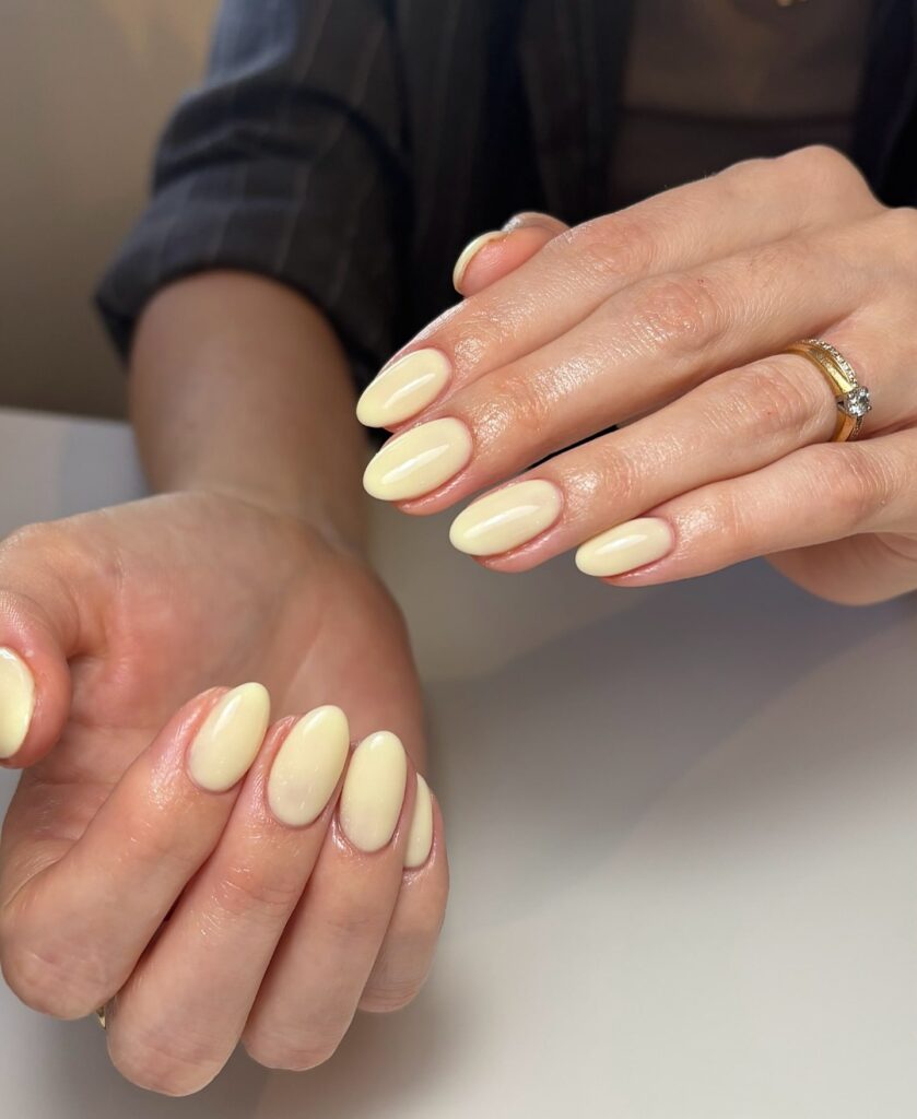 Pastel Yellow Almond Nails with Glossy Finish – Subtle and Classy Spring Nail Ideas