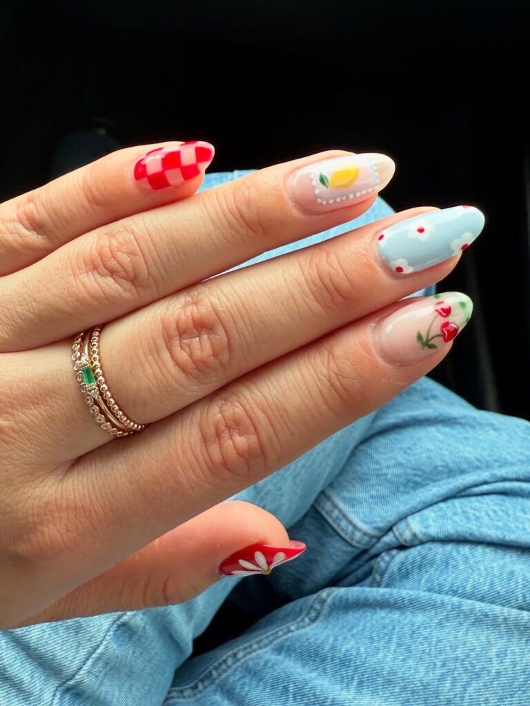 Playful Mismatched Summer Nail Art with Cherries, Lemons, Clouds and Daisies