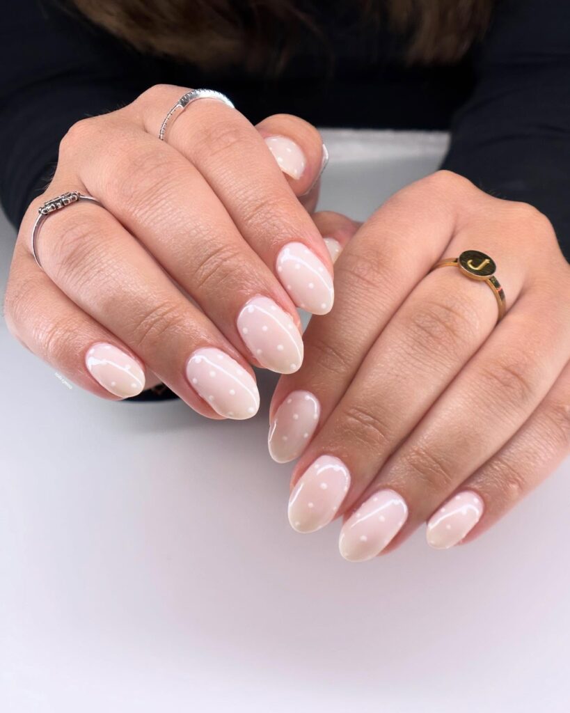 Polka Dot Almond Nails with Nude-Pink Base for a Vintage Birthday Vibe