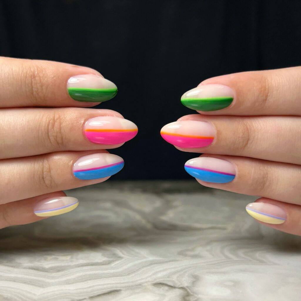 Rainbow Stripe French Nails with Nude Base and Rounded Tips