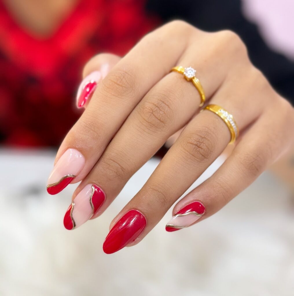 Romantic Almond Red and Blush Pink Nails with Gold French Tip Accents