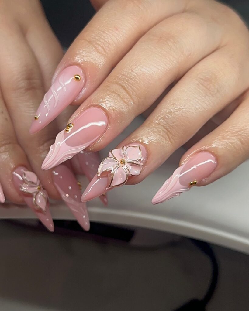 Romantic Stiletto Birthday Nails with Sculpted Flowers and Gold Swirl Details