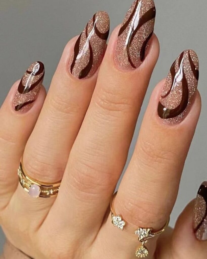 Rose Gold Glitter and Brown Swirl Almond Nails – Modern Short Nail Ideas for a Chic Finish